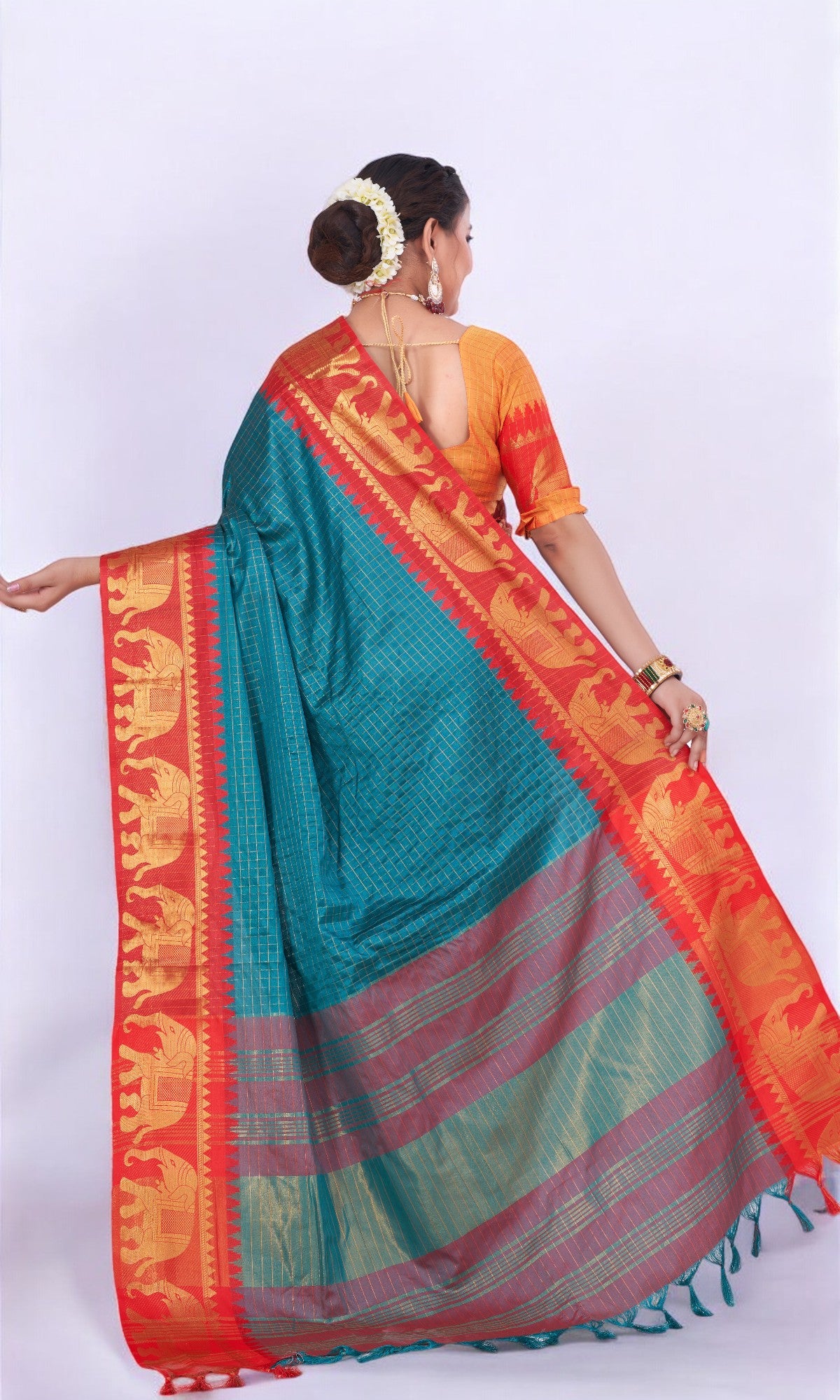 Teal Blue Silk Saree Embellished With Elephant Jari Work