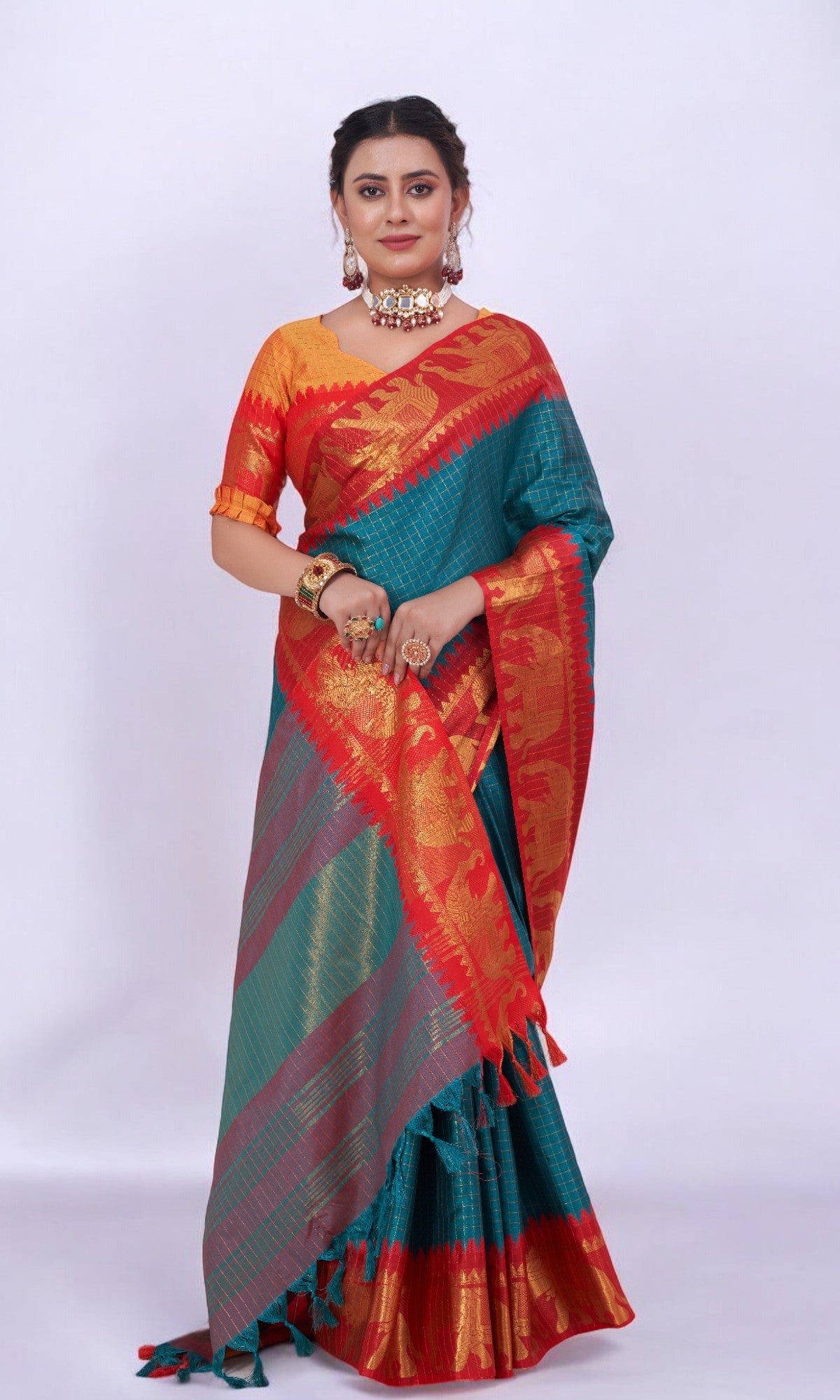 Teal Blue Silk Saree Embellished With Elephant Jari Work